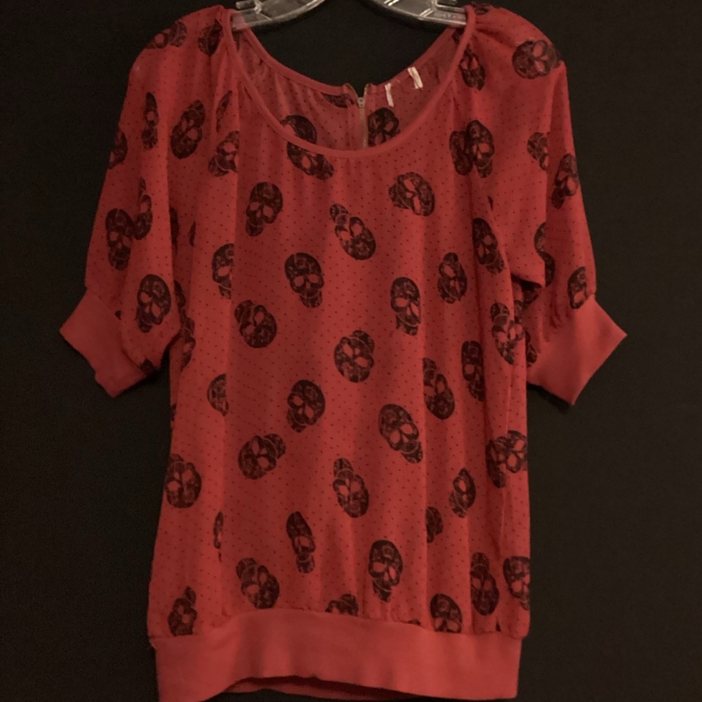Red and black skull print top